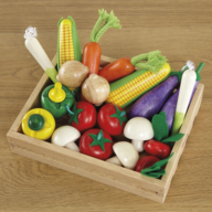 A box of wooden fruit and vegetables