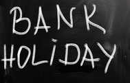 "Bank holiday" written in white chalk on a black chalkboard
