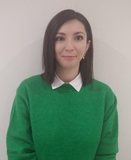 A woman looking at the camera