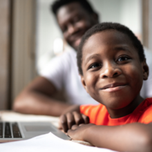 Boy smiles at camera
