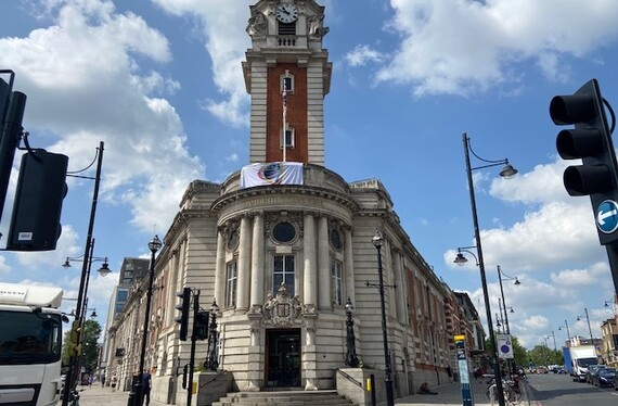 Town Hall front entrance with Windrush flag