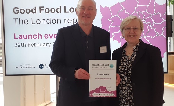 Jim Dickson collects certificate 