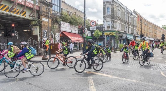 Children cycling on road in Brixton