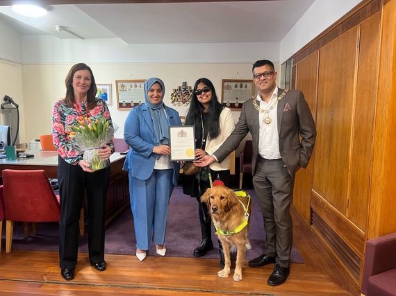 Ruqaiya Asim receiving Borough Recognition Award