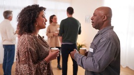 man and woman talking