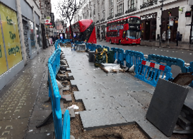 New paving being laid on New Oxford Street
