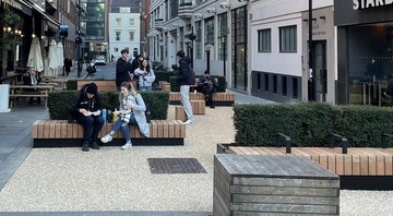 CApper Street pocket park with people sitting and enjoying the space