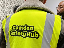 Man in a high vis jacket with the text 'Camden Safety Hub'