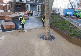 New resin being laid around the trees at Princes Circus
