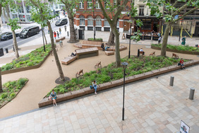 view of Princes Circus northern space from above with seating, plants and trees where there once was a road