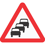 Road sign cars queing
