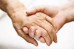 Care Act carer holding hands with elderly person