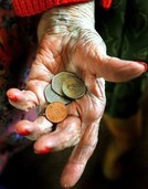 money in old persons hand carer