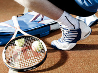 Tennis racquet, shoe and balls