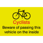 Cyclists and lorry sign