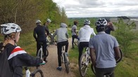 Group of young people on bikes