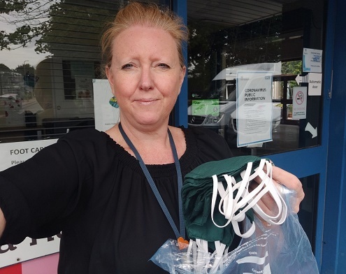 Sharon Adkins with face masks