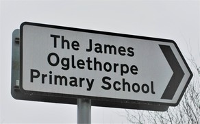 School direction sign cropped