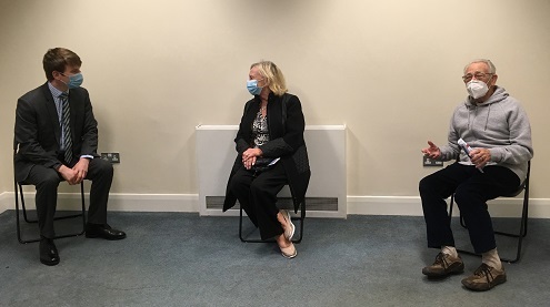 Leader with patients waiting for vaccine Dec 2020