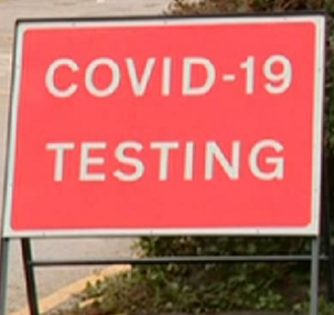 Red COVID testing sign 495 px
