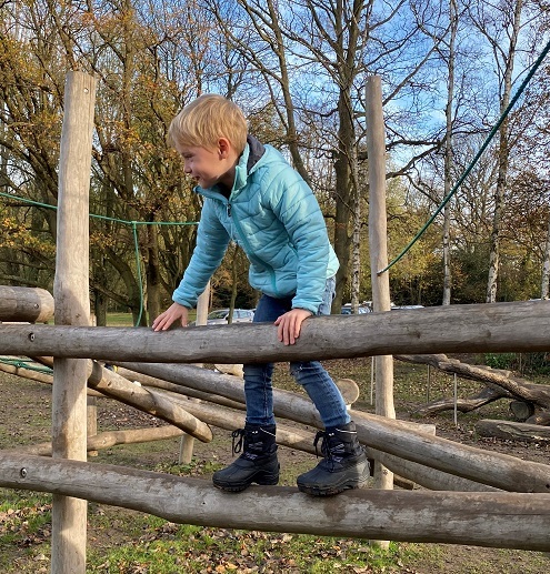 Young boy on Bedfords park climbing frame Nov 2020