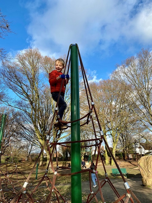 Boy on climbing frame in Raphael's Park Romford Dec 2020