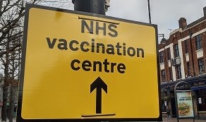 Vaccination centre sign n South Street Romford, 23 March 2021