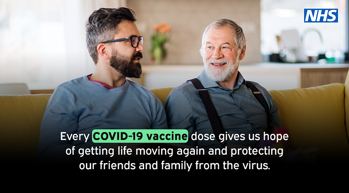 Vaccine banner with 2 men May 2021