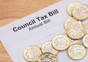 Council tax bill with money