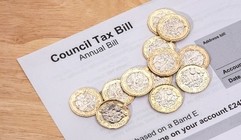 Council tax bill with money
