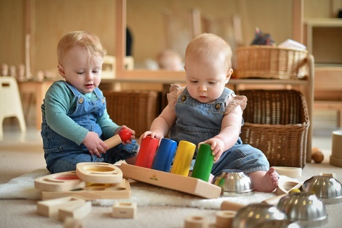 Two young children playing in a nursery school (Learning Tree advertorial picture)