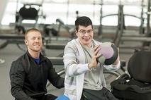 Lad with ball in gym