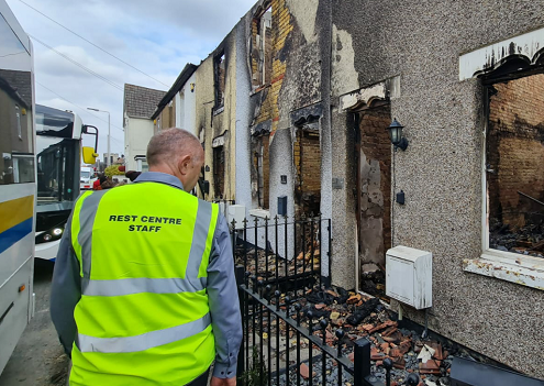 Leader inspecting fire damage in Wennington 20 July 2022