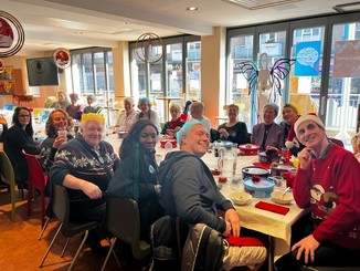 Salvation Army Volunteers enjoying a free Christmas lunch