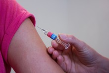 A person receives a vaccination