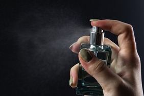 Perfume spraying stock image