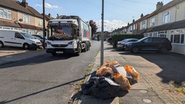 Rubbish collection truck on bin day