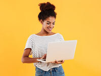 Woman holding a laptop