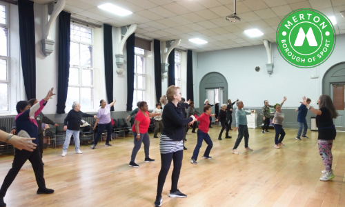 People dancing in a hall at Attic Theatre's Movement Mornings session