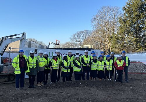 Councillors and Clarion housing workers at the construction site in Eastfields Estate, Mitcham.