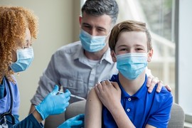 teenager getting vaccinated 