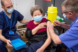 woman getting vaccinated 