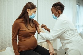 pregnant woman getting vaccinated 