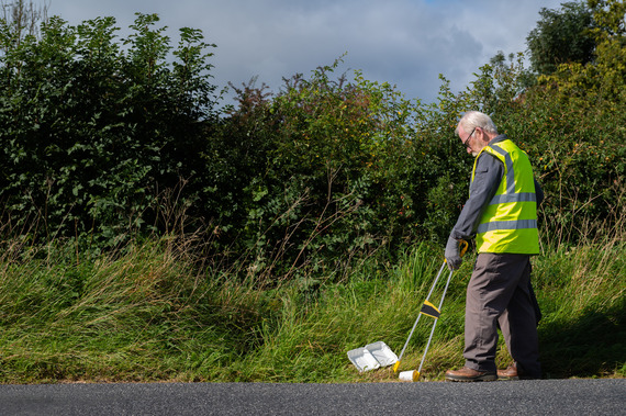 Senior man doing voluntary litter picking