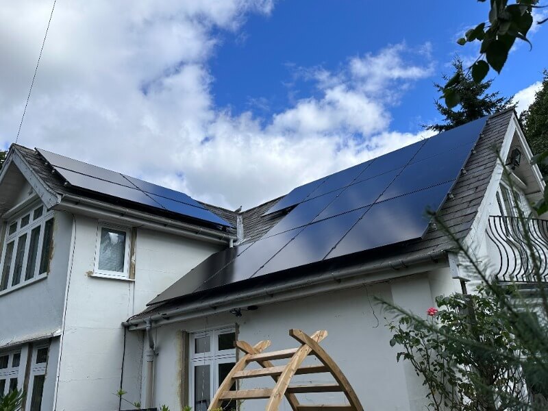 Solar panels on a white house