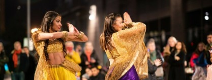 Bollywood Co dancers close up New Union Square festival hub