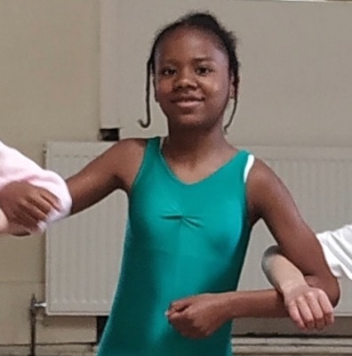 young girl in leotard