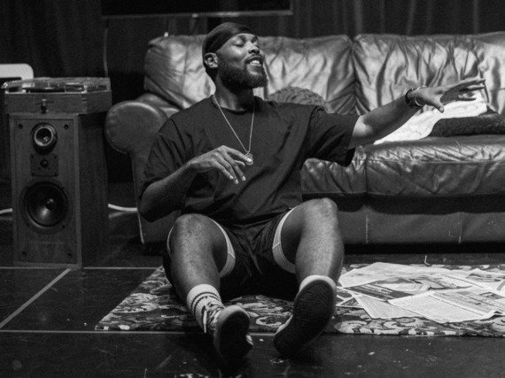 A Black Actor Onstage Performing For Writerz And Scribez Captured By Black Daffodil Photography