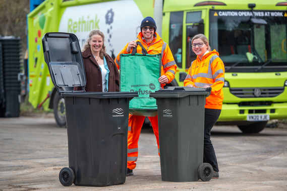 Cllr Maples with staff and refuse bins