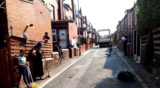 Community Spirit - Residents engage with local officers and sweep street 